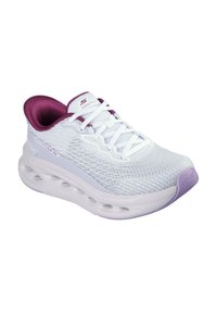Zapatilla deportiva blanca con parte superior de malla, detalles en lavanda y suela texturizada con cápsulas de aire para amortiguación. Diseño con cordones y cuello acolchado.