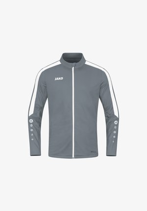 Graue Sportjacke mit weißen Seitenstreifen, hohem Kragen, durchgehendem Reißverschluss und runden Logo-Akzenten an den Ärmeln. Leicht und mit glatter Textur.