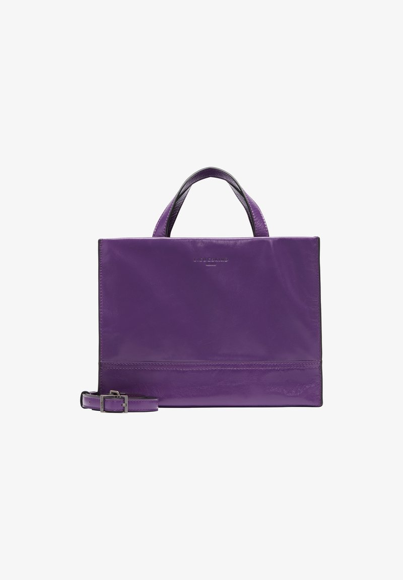 Sac à main en cuir violet avec une conception structurée, doté de poignées courtes et d'une bandoulière amovible. Texture lisse et branding minimal.