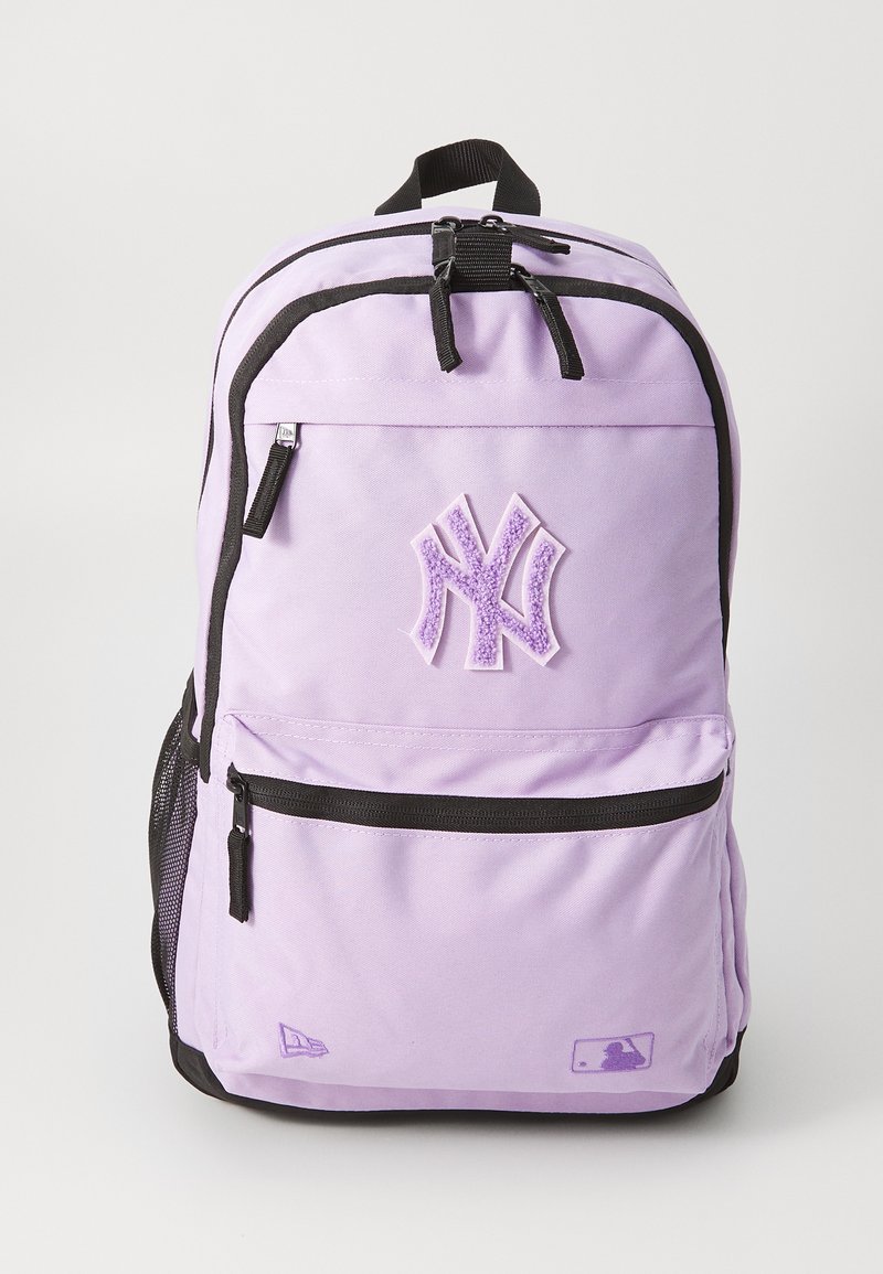 Purple fabric backpack with black accents, featuring a prominent purple embroidered New York Yankees logo and multiple zippered compartments.