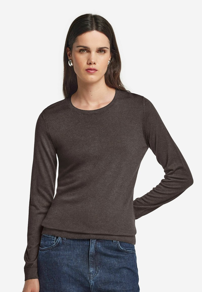 Mörkbrun långärmad tröja i jersey med rund halsringning och figurnära design. Har ribbade ärmslut och midja, tillverkad av mjuk, slät tyg.