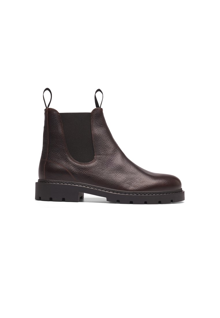 Brown leather Chelsea boot with elastic side panels, textured finish, and sturdy black rubber sole with notches for grip.