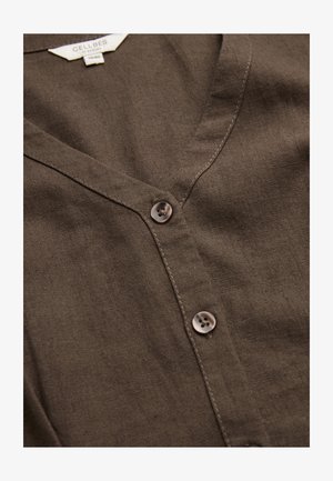 Brun V-udskæring linned skjorte med knapper, synlige syninger og label med teksten "Cellbes" i størrelse 38/40.