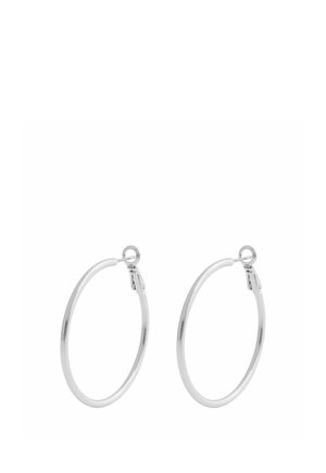 Pair of thin, silver hoop earrings with hinged clasp closures, displayed on a plain white background.