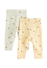 Δύο ζευγάρια παιδικά κολάν από μαλακό βα μβάκι: ένα ανοιχτό πράσινο και ένα απαλό κίτρινο, και τα δύο με μικρά σχέδια με μέλισσες και μαλακές ελαστικές μέσες.