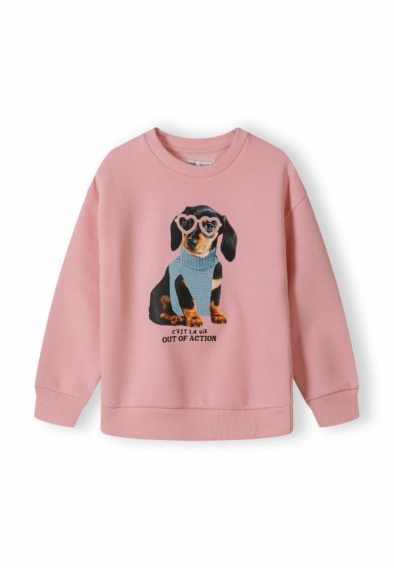 Sweat-shirt rose avec un teckel portant un pull bleu et des lunettes en forme de cœur roses, texte en dessous : « C'est la vie Out of Action. »