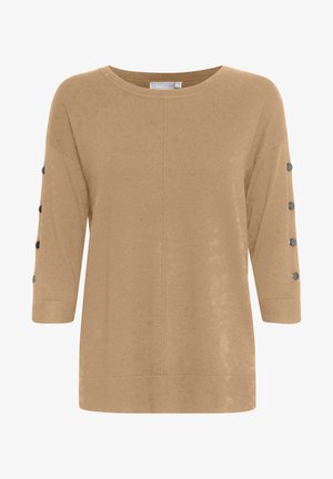 Vaaleanruskea neulottu paita, jossa on leveä kaula-aukko, kolmanneksen pituiset hihat ja mustat nappikoristeet hihansuiden reunassa. Pehmeä pinta, rento istuvuus.