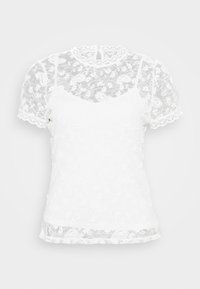 Biała bluzka krótko rękawowa z przezroczystą koronką, wzór paisley, falbaniasty dekolt i detalami na zakończeniu. Warstwowy fason z miękką teksturą.
