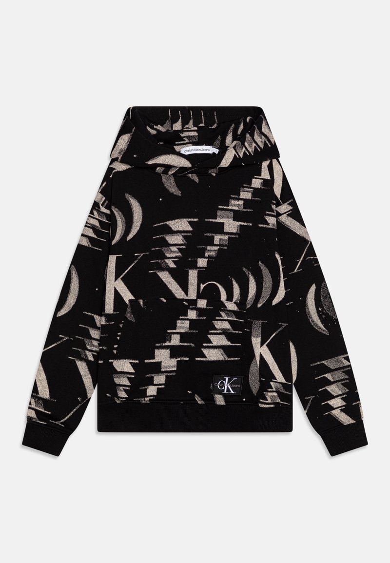 Sweat à capuche noir avec motifs géométriques et lettres beiges, poche kangourou à l'avant, et logo Calvin Klein Jeans visible sur la poche.