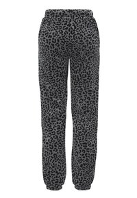 Graue Sweatpants mit schwarzem Leopardenmuster, elastischem Bund und schmal zulaufenden Bündchen. Weiches Material mit lässigem Design.