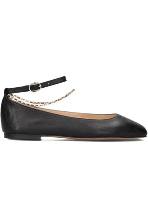 Black leather ballet flats with pointed toe, ankle strap, and gold chain detailing. Smooth texture with a slip-on design. Flat sole.