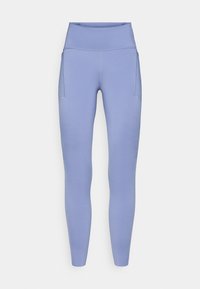 Leggings de cintura alta de color púrpura claro, hechos de tela elástica, con una textura suave y un bolsillo lateral. Diseño sin costuras en la cinturilla.