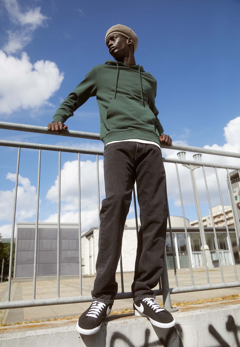 blue carhartt wip pontiac pants