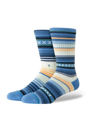 Gestreepte sokken in blauw, groen en oranje tinten. Ribbelstructuur met strepen van verschillende breedtes. Versterkte teen- en hielgedeelten.
