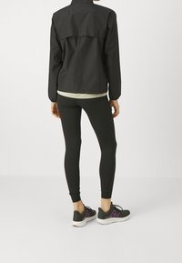 New Balance Veste de running - black