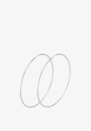 Srebrne okrugle naušnice s minimalističkim dizajnom. Kružni oblik, glatka tekstura i tanak profil. Lagane s poliranim završetkom.