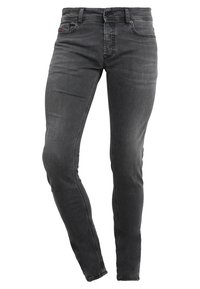 Jeans ajustados en denim gris oscuro, con un diseño clásico de cinco bolsillos, detalles de costura y una textura ligeramente desgastada.