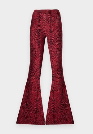 Stieglitz MISO FLARED LEGGINGS - Pajkice – hlače - red