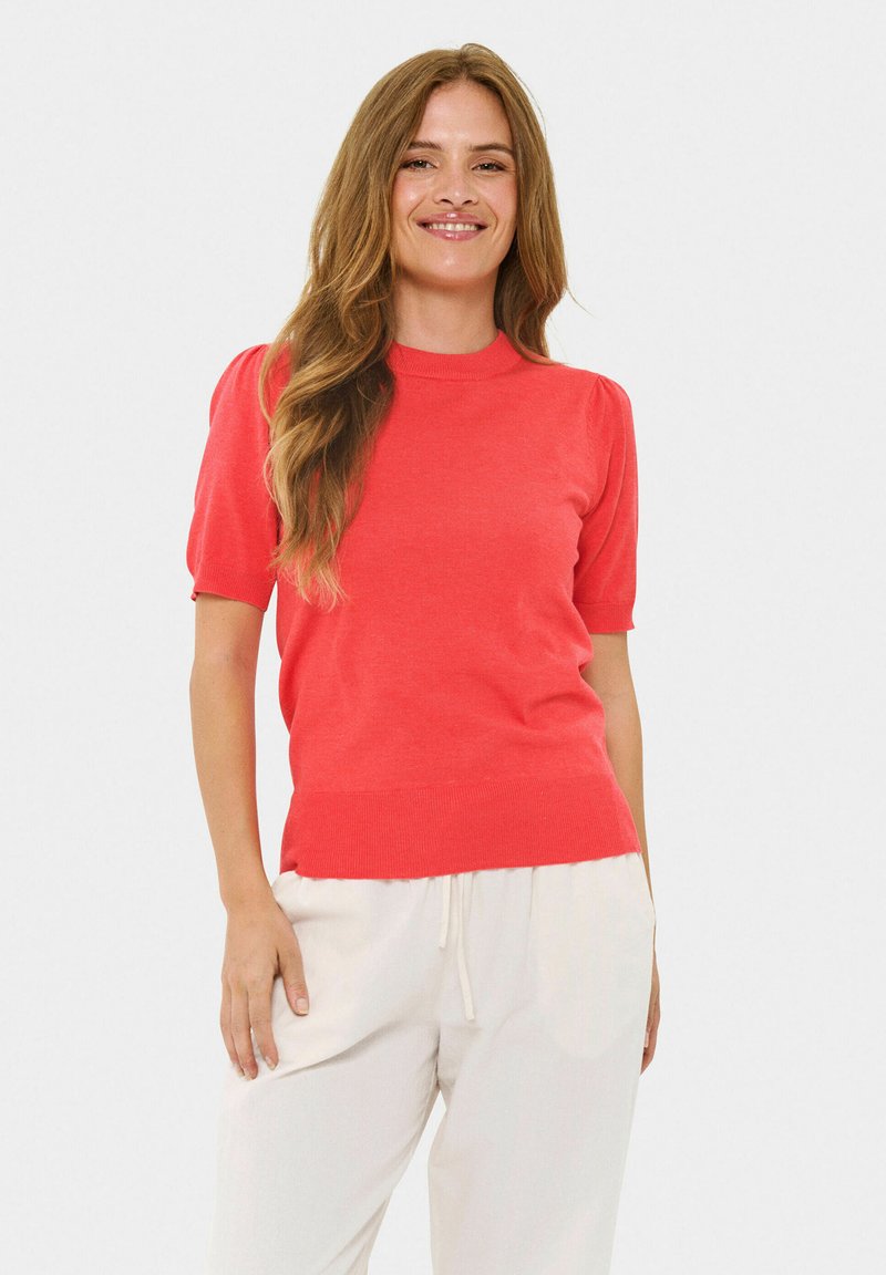 Maglione corto a maniche corte color corallo con collo a girocollo a coste e orlo aderente, realizzato in un tessuto morbido e liscio che cade comodamente.