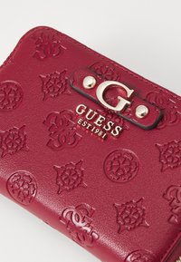 Guess GERTY MEDIUM ZIP AROUND - Portofel - claret