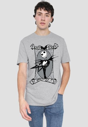 Gray T-shirt featuring a black-and-white graphic of a character inside a ornate border with spiderweb elements. Short sleeves, standard fit.