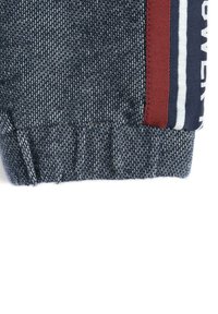 Chicco Jogginghose - grey