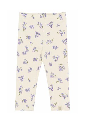 Kerge beeži värvi puuvillased retuusid, millel on lilletprint roheliste lehtedega. Omavad pehmet tekstuuri ja elastset vöökohta.