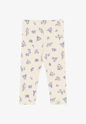 Bavlnené legíny v svetlej béžovej farbe s kvetinovým motívom fialových kvetov a zelených listov. Majú mäkkú textúru a elastický pás.