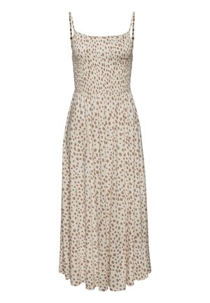 Mouwloze beige midijurk met dunne bandjes en een bruin patroon van onregelmatige polkadots, nauwsluitende geplooide top en vloeiende rok.