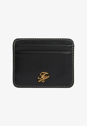 Zwarte leren kaarthouder met witte stiksels en goudkleurig monogramlogo, voorzien van twee kaarthouders aan de voorkant.