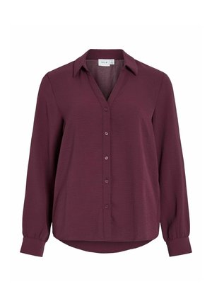 Burgundy long-sleeve blouse with a collared neckline, button front, and a curved hem. Made of lightweight fabric with a slightly textured finish.