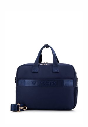 Sac de voyage bleu marine avec deux poignées et une sangle amovible, fabriqué en nylon, avec le nom de la marque en relief et des fermetures éclair dorées.