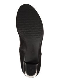 Semelle de chaussure en cuir noir avec un design texturé, dotée d'un accent argenté distinctif au talon et du nom de la marque embossé.