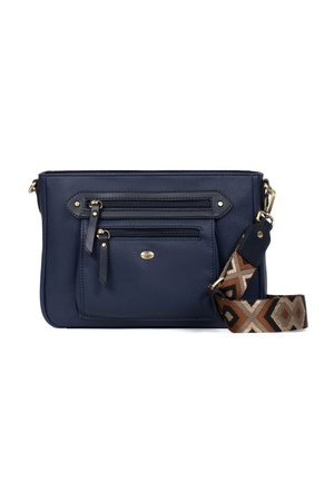 Granatowa torebka przewieszana przez ramię z dwoma przednimi kieszeniami na suwak i odpinanym brązowo-beżowym paskiem w wzory.