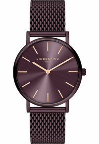 Runde Uhr mit einem tief lila Zifferblatt, goldenen Minutenmarkierungen und einem strukturierten Mesh-Armband. Sie bietet ein minimalistisches Design mit einer glatten Oberfläche.
