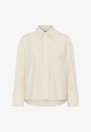 Chemise crème à manches longues avec boutons, dotée de fines rayures verticales et d'un col pointu, avec un ourlet légèrement arrondi et des manches à manchettes.