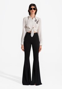 SAX35TH by Alicja Czarniecka WIDE - Hlače - black