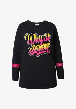Sort sweatshirt med "Why so serious" grafik i pink og gul. Har pink sekvins accentremme på ærmerne og en ribbet krave.
