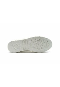 Suola di scarpa in gomma bianca con un motivo testurizzato e scanalature; presenta due linee verticali e accenti laterali per una migliore presa.