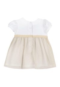 Weißes Oberteil mit kurzen Puffärmeln, Knopfverschluss am Rücken und beiger Rock mit dezenten Sprenkeln. Baumwollmischung, weicher und leichter Stoff.