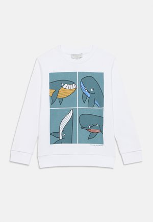 Sweat-shirt blanc avec un graphique carré représentant quatre baleines dessinées en style cartoon, dans des tons de bleu et de jaune, sur un fond bleu sarcelle.