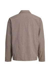 Brown checkered jacket with a collared neckline, long sleeves, and a textured fabric, featuring a relaxed fit and subtle grid pattern.