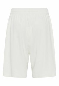 White, loose-fitting shorts made of a textured fabric with a ribbed pattern. Elastic waistband without additional hardware or pockets.