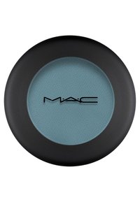 MAC ögonskugga i ett runt, svart fodral med matt yta. Det pressade pulvret är ljusblått med en texturerad yta.