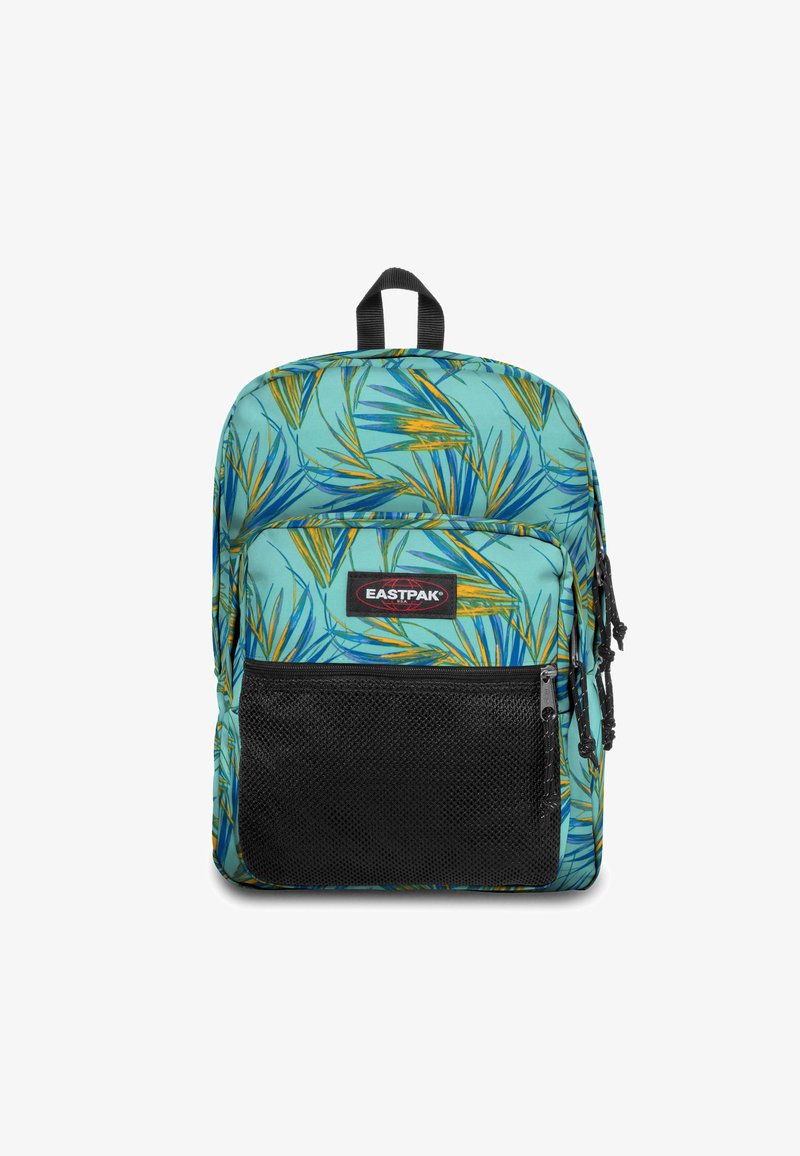 Plecak o turkusowym tle i wzorze liści w zieleni i żółci. Posiada czarną przednią kieszeń oraz podwójny zamek błyskawiczny. Wykonany z materiału tekstylnego.