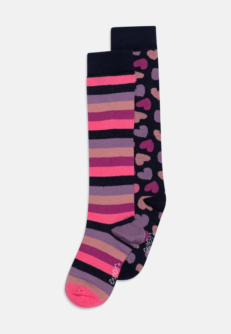 Ribatud ja laikudega põlvikud; ühel küljel on roosa, lilla ja tumesinise triibud; teisel küljel on tumesinine taust roosa ja beezide laikudega.