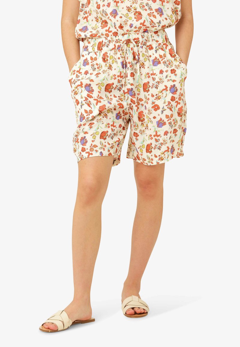 Pantaloni corti floreali con vita elasticizzata regolabile, tasche laterali e un tessuto leggero e traspirante con accenti rossi, viola e verdi.