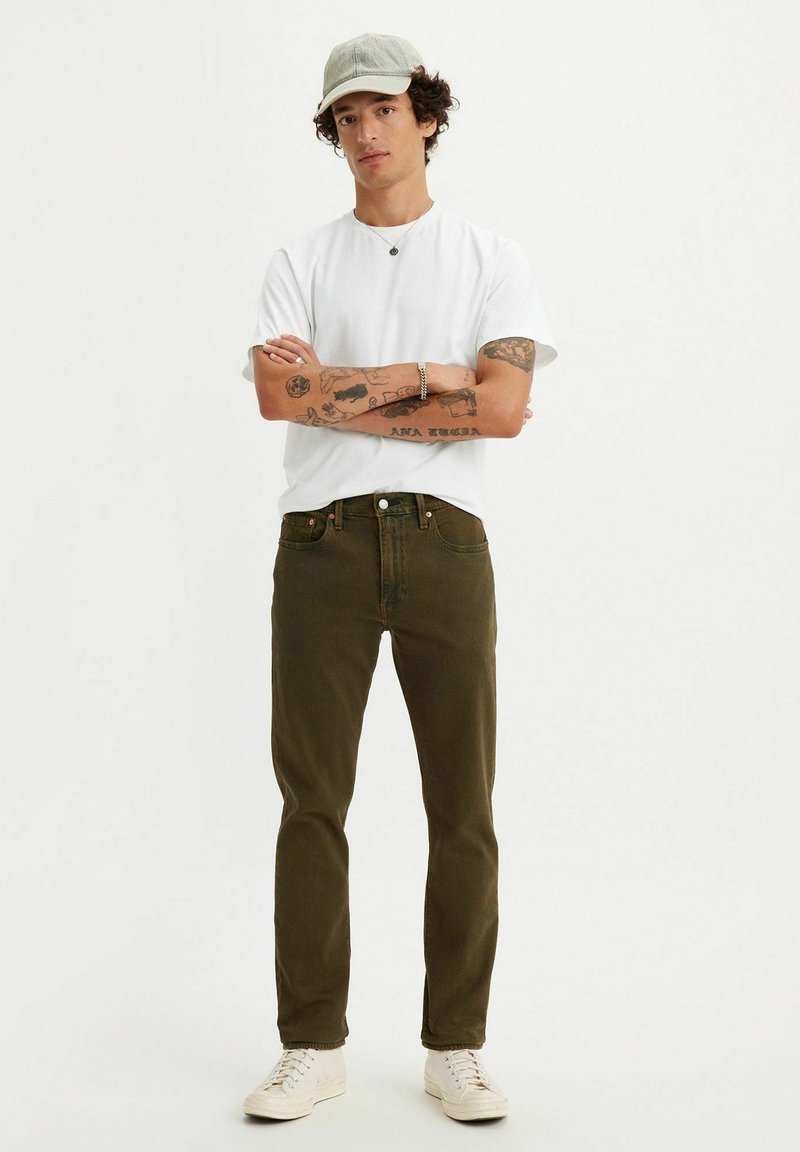 Levi's® Vaqueros tapered - moto cross adv