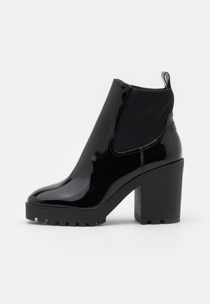 Bottines à talons hauts - black
