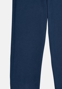 Navy blue cotton joggers with a smooth texture, tapered legs, and an elastic waistband for comfort. No visible patterns or accents.